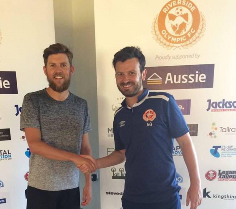 HE'S BACK: NPL veteran Aaron Campbell is welcomed home into the Riverside Olympic fold by head coach Alex Gaetani at the start of the month. Picture: Supplied