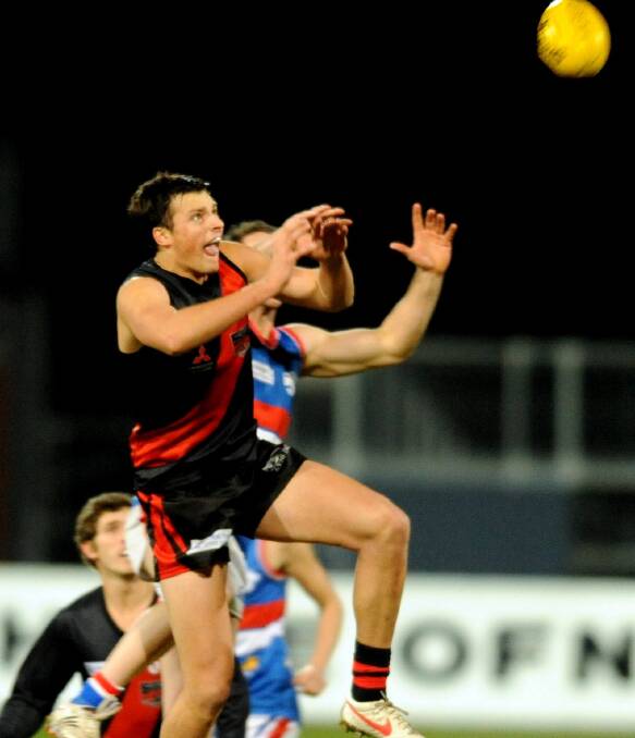 BABY BOMBER: Emerging North Launceston ruckman Toby Nankervis flies high for a mark against South Launceston in his final year playing at Invermay. Picture: Will Swan