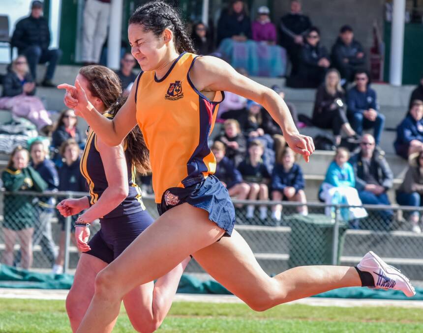 EYES SHUT: Scotch College talent Isobel Foster takes out her 200m race.