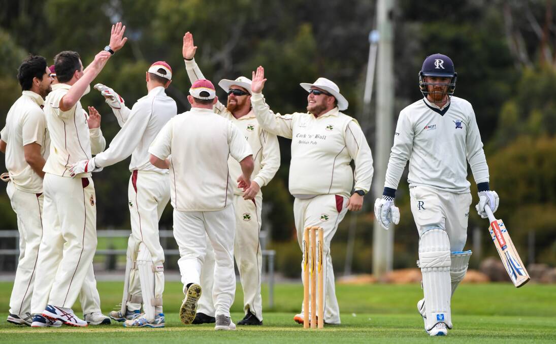 YOU BEAUTY: Westbury hand out high fives all round on Saturday following the dismissal of Riverside batsman Peter New. Pictures: Neil Richardson