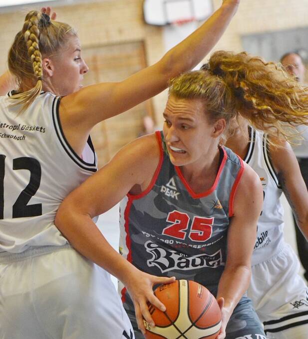 HUSTLE: New Launceston Tornadoes recruit Megan McKay battles her way to the hoop in Germany ahead of arriving to start a NBL1 career at Elphin in April. Picture: Gabi Horndl