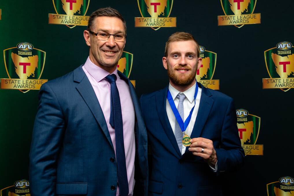 RETURNING: Alastair Lynch meets Josh Ponting again after the North Launceston star took home the former Fitzroy and Brisbane great's medal for a second year in a row. 