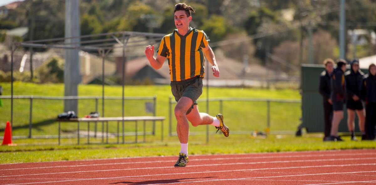 CATCH ME: St Patrick's College's Andrew James flies home to take out the boys' open 200 metres.
