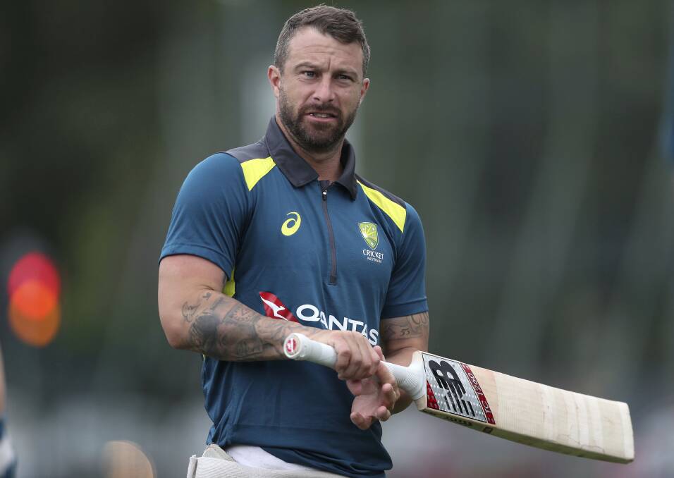BACK IN: Matthew Wade gets a grip on his Ashes selection. Pictures: AP 
