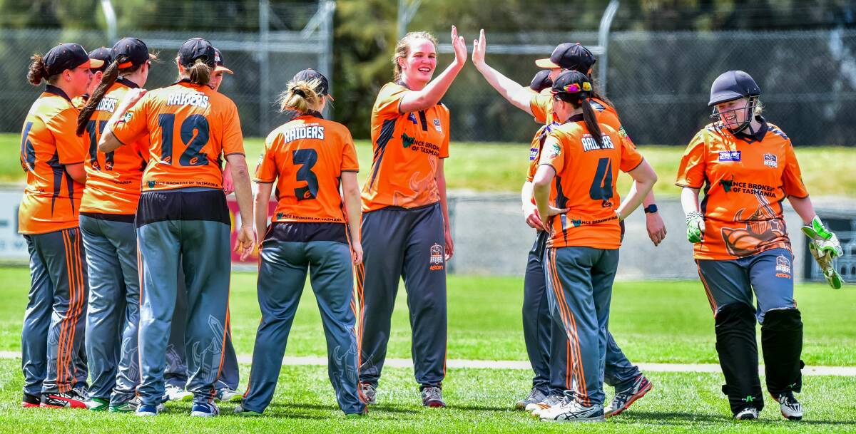 CELEBRATORY: A Greater Northern Raiders teammate offers a high five to Rhianne Hack, who will miss the side's T20 double-header road trip South on Saturday over Hobart Hurricanes WBBL commitments. Picture: Neil Richardson