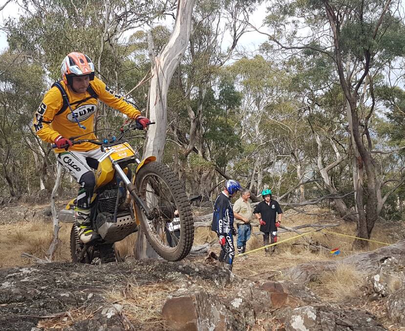 ROCKY OUTLOOK: Kurt Pickering climbs up one of the obstacles at the Tasmanian moto trails two-day titles out at Powranna. Pictures: Ashlee Lockhart