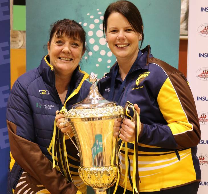 DOUBLE TROUBLE: Northern Hawks co-coaches Kellie Woolnough and Ruth Tuohy with the 2018 premiership coach. 