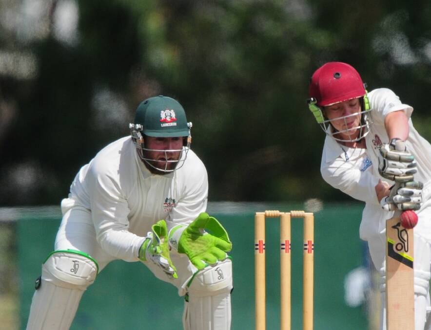 CLOSE CALL: Standing up behind the stumps, Alistair Taylor has become an advocate for the use of helmets after suffering concussion last season. 