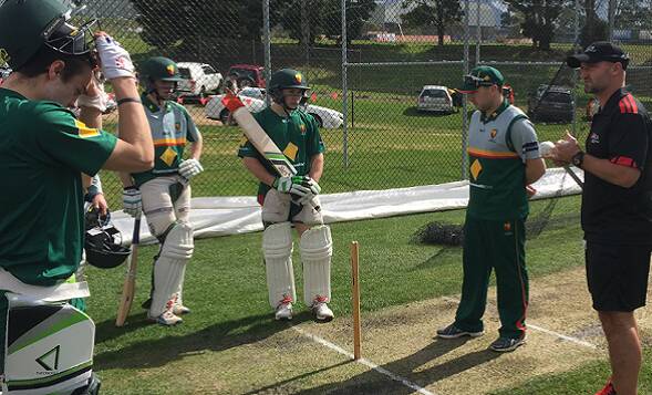 LISTEN UP: Micheal Di Venuto passes by an under-17 Cricket Tasmania squad in 2015 to hand out some advice to the state's future stars. Picture: Cricket Tasmania.