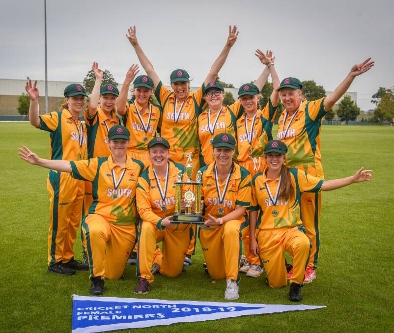 THAT'S FOUR: South Launceston player-of-the-match Caitlyn Webster and captain Belinda Wegman hold onto the Cricket North women's trophy once again. Picture: Paul Scambler