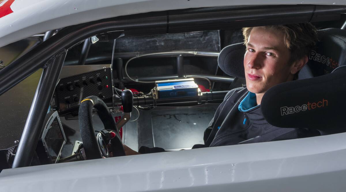 BEHIND THE WHEEL: Launceston-raised Australian karts champion Lochie Dalton gets nice and comfortable inside a trans-am car ahead of a hopeful Toyota 86 racing series. Pictures: Phillip Biggs