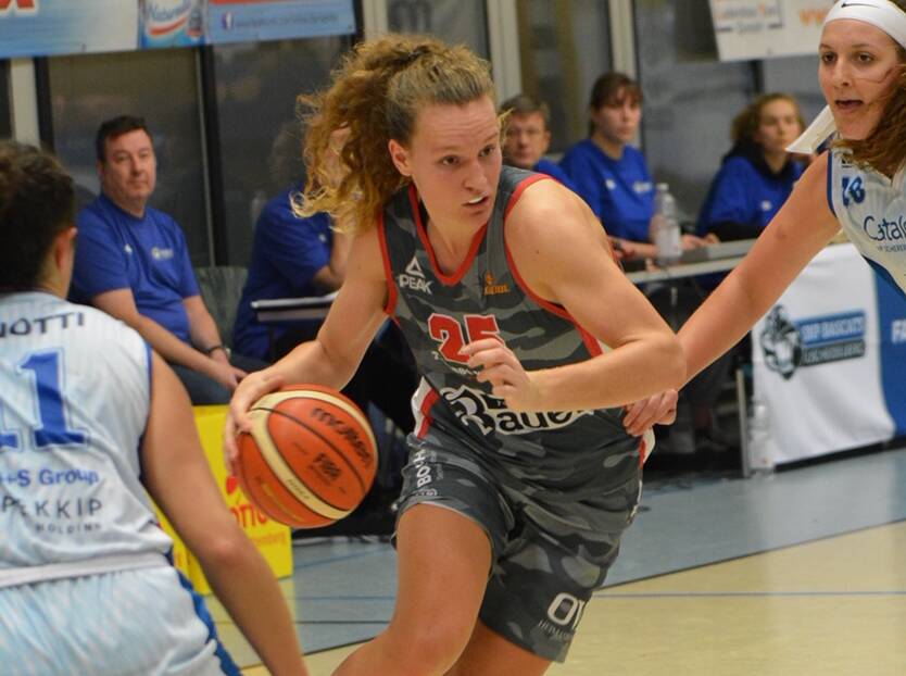CLOSE QUARTERS: West Australian Megan McKay works hard last summer playing in Germany. Picture: Gabi Hrndl