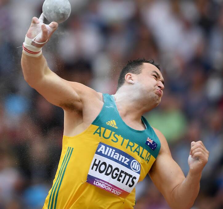DETERMINED: Launceston's Todd Hodgetts throws with force in the men's shot put F20 final at the World Para-Athletics Championships held in London. Picture: Getty Images