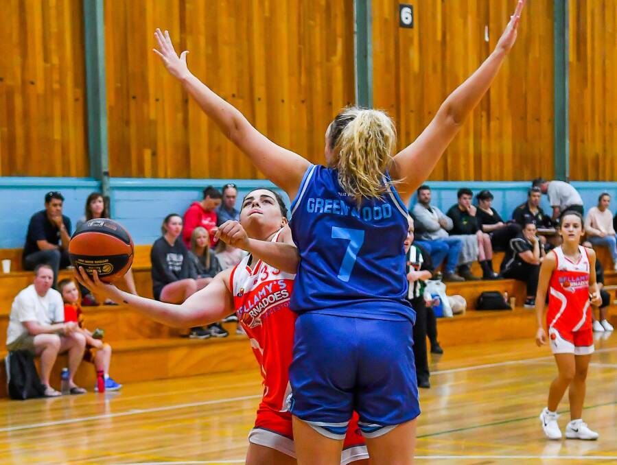 DETERMINED: Tornadoes talent Ellie Collins looks to find a way to the basket past the stodgy Hobart Chargers defence on Sunday during the 2018 Basketball Tasmania Classic in Launceston. Pictures: Scott Gelston