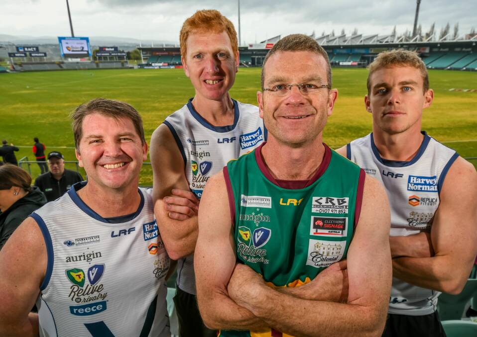 TO A GOOD CAUSE: Friendly combatants Justin Metcalf, Andrew McLean, Matt Jones and Tom Couch prepare for Saturday's Relive the Rivalry clash. Picture: Phillip Biggs