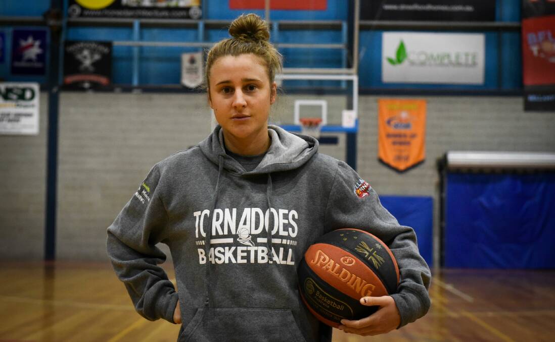 SATISFIED: Launceston skipper Lauren Mansfield will suit up for Australia next month at basketball's world cup.