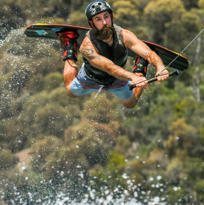 MAKING A SPLASH: Nigel Curran tests out gravity riding in the professional division at the Trevallyn round of the Tasmanian wakeboarding summer series. 