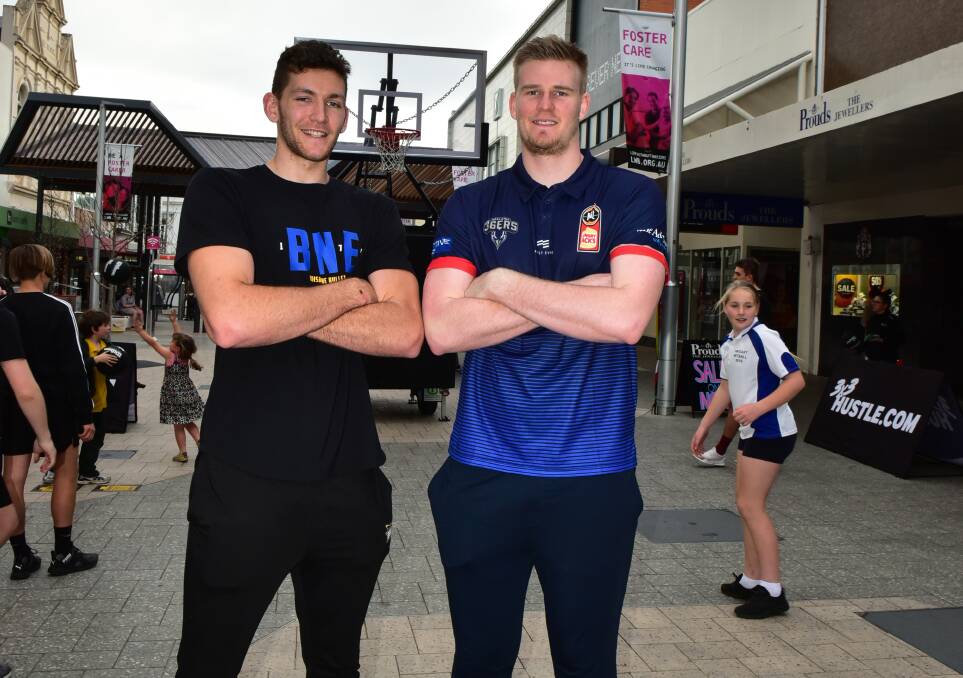 BIG SHOTS: Brisbane Bullets power forward Will Magnay and Adelaide 36ers centre Harry Froling stand toe to toe together. Pictures: Neil Richardson