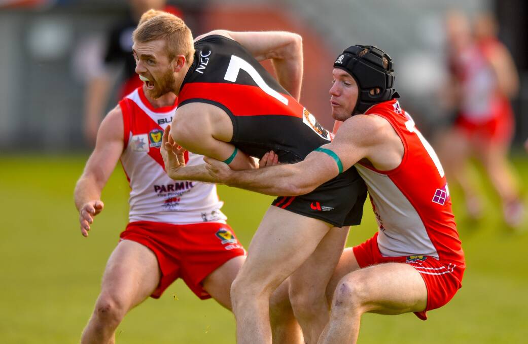ROO TRAP: North Launceston midfielder Josh Ponting gets caught in Clarence's trap in their earlier meeting at Bellerive Oval. Picture: Solstice Digital