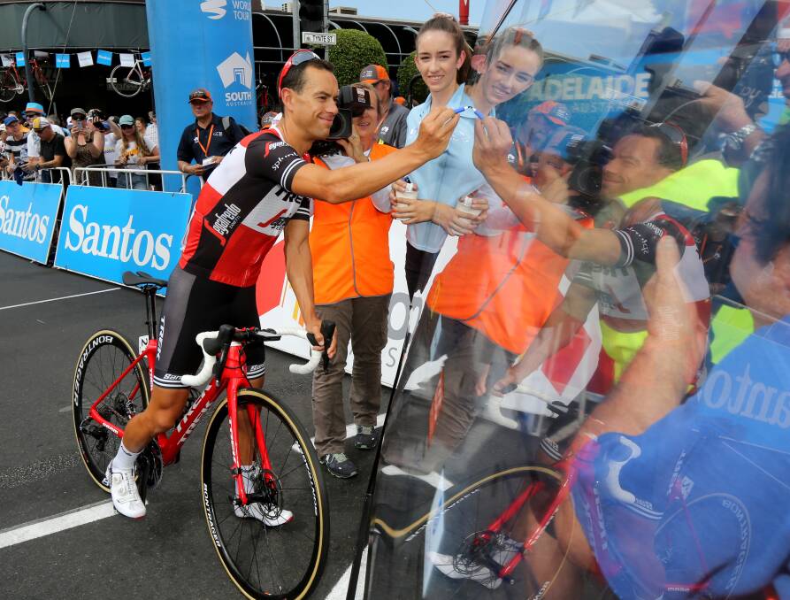 RELAXED: Champion Hadspen rider Richie Porte cracks a pre-race smile while signing in for this year's Tour Down Under in Adelaide ahead of stage 1 on Tuesday. Picture: AAP