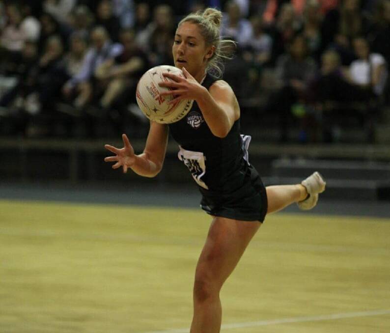 CATCH IT: Launceston-bred Shelby Miller in full flight on Saturday night for the Tasmanian Magpies. Picture: Magpies Netball.