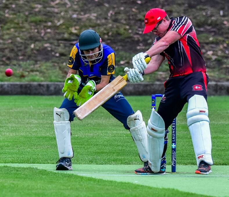 OVER THE TOP: Hadspen batsman Adam House looks to drive on the up against Trevallyn. Picture: Neil Richardson