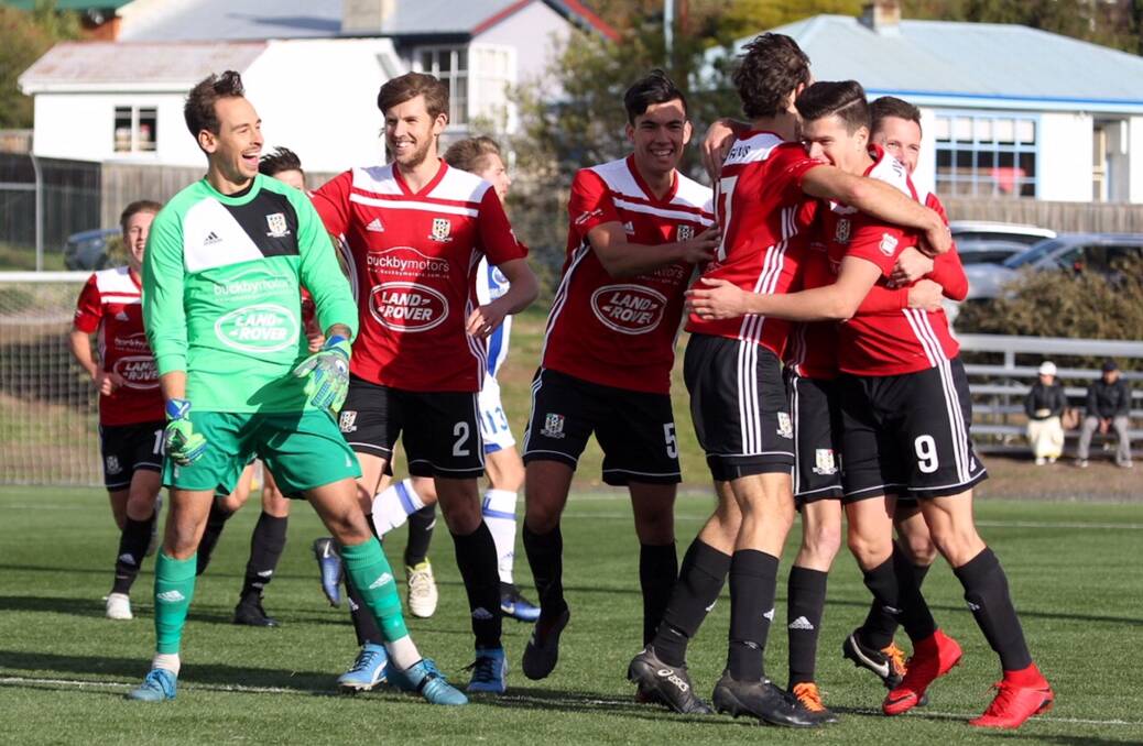PARTY TIME: Launceston City players celebrate a second goal that delivered a top-of-the-table victory against hosts Olympia at Warrior Park on Sunday. Picture: Solstice Digital