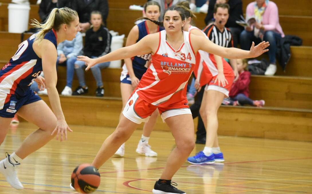 ON GUARD: Launceston forward Ellie Collins looks to protect space. Picture: Paul Scambler