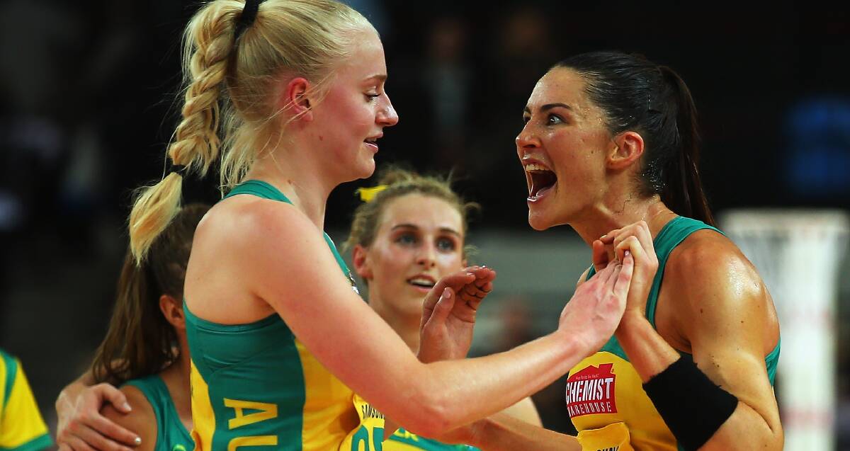 WE'RE TEAMMATES: Australian defenders Caitlin Thwaites and Sharni Layton are set to play in Launceston next month before turning out for the 2017 Magpies. Photo: Getty Images