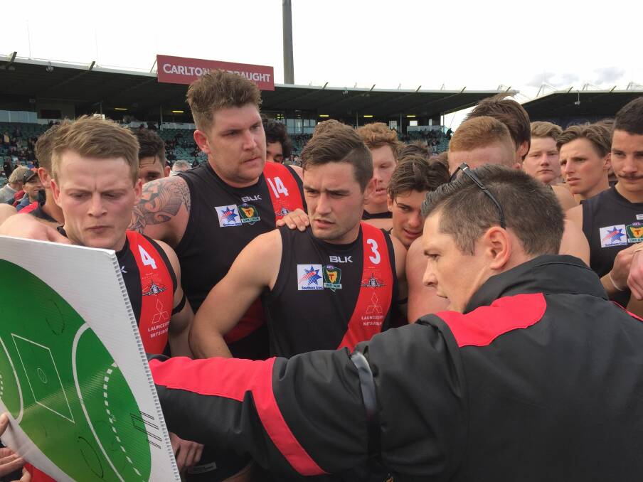 MASTER: Littlejohn makes his point during a quarter-time break in the North Launceston fold before his Lions stint.