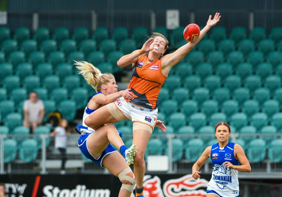 BRUISING: New Kangaroo Abbey Green flies hard for the ball against GWS Giants on Saturday. Picture: Phillip Biggs