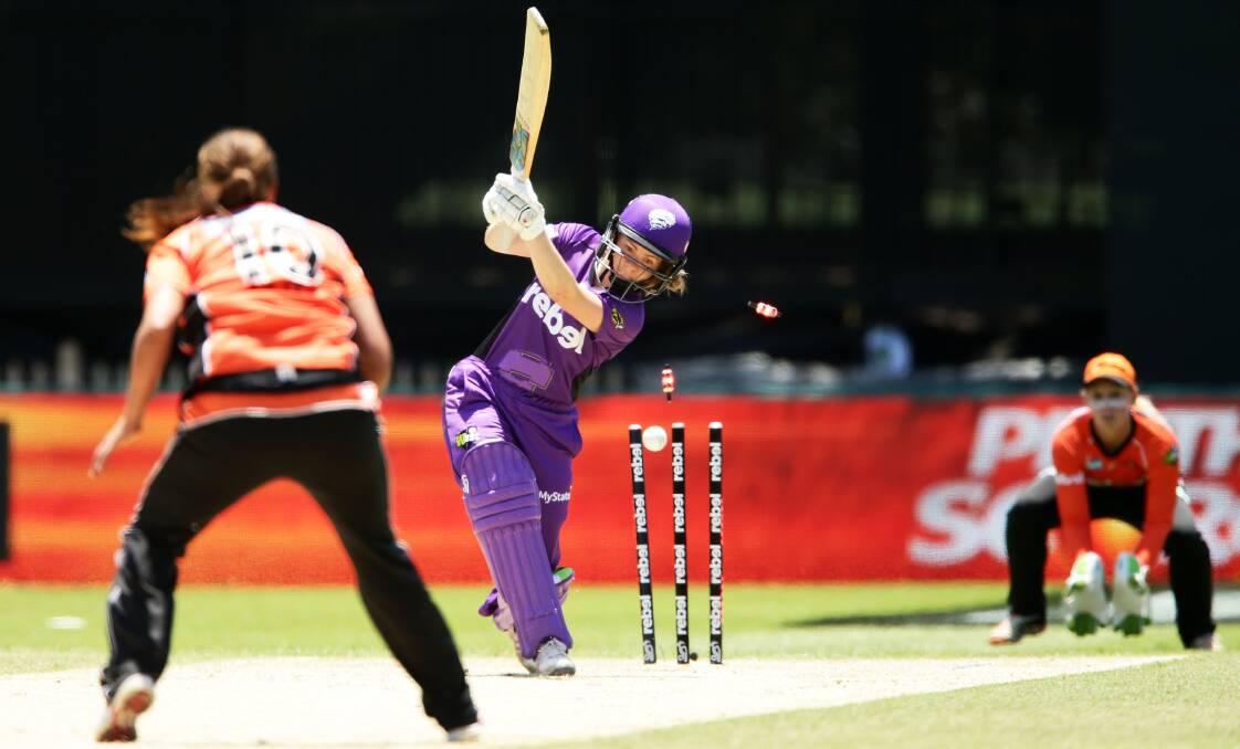 CLEANED UP: Hurricanes opener Georgia Redmayne has her stumps rattled in Sunday's WBBL clash at North Sydney Oval. Picture: Getty Images 