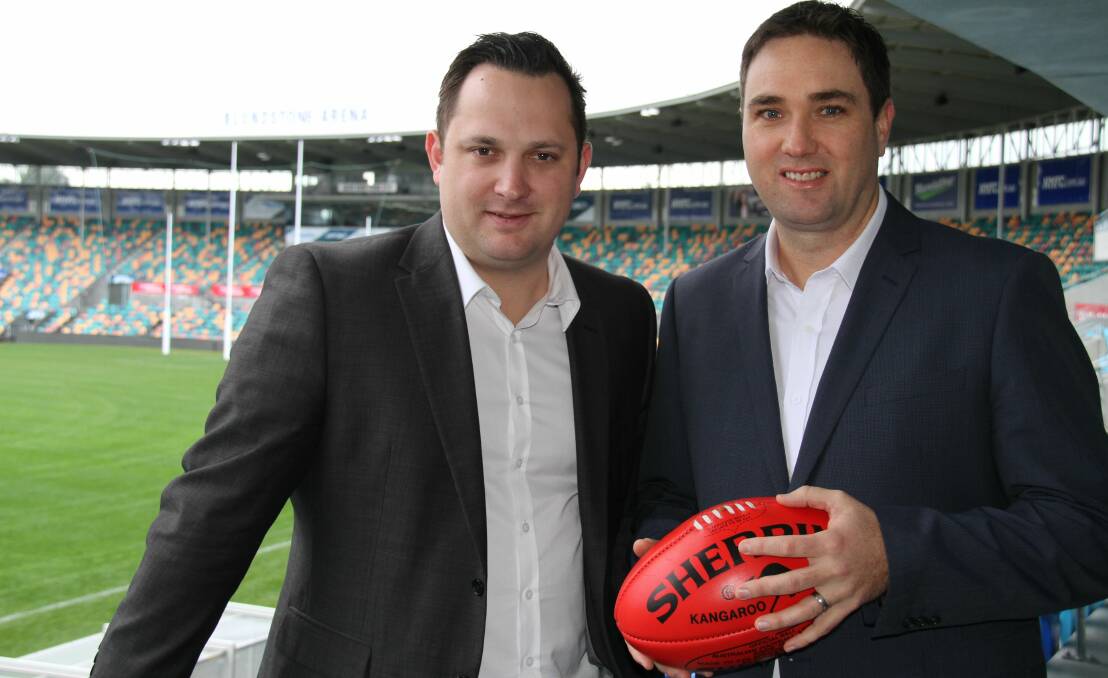 CASTING AN EYE: Tasmanian Football Council general manager Jackson Hills, with TSL general manager Carl Saunder, focus on providing facilities for women's footy.