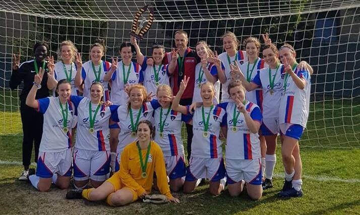 CELEBRATED: Northern Rangers women's championship-winning side with coach Rod Fulton. Picture: Facebook