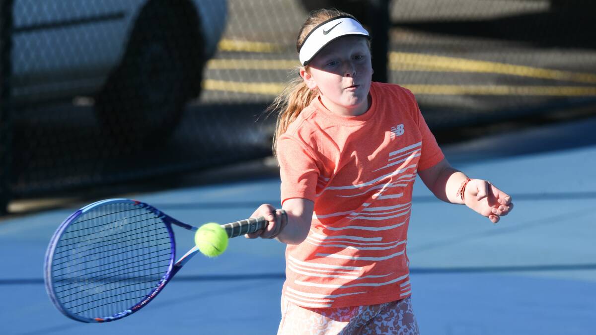 DETERMINED: Hobart talent Alicia Dale gets in line with the ball in the state trials.
