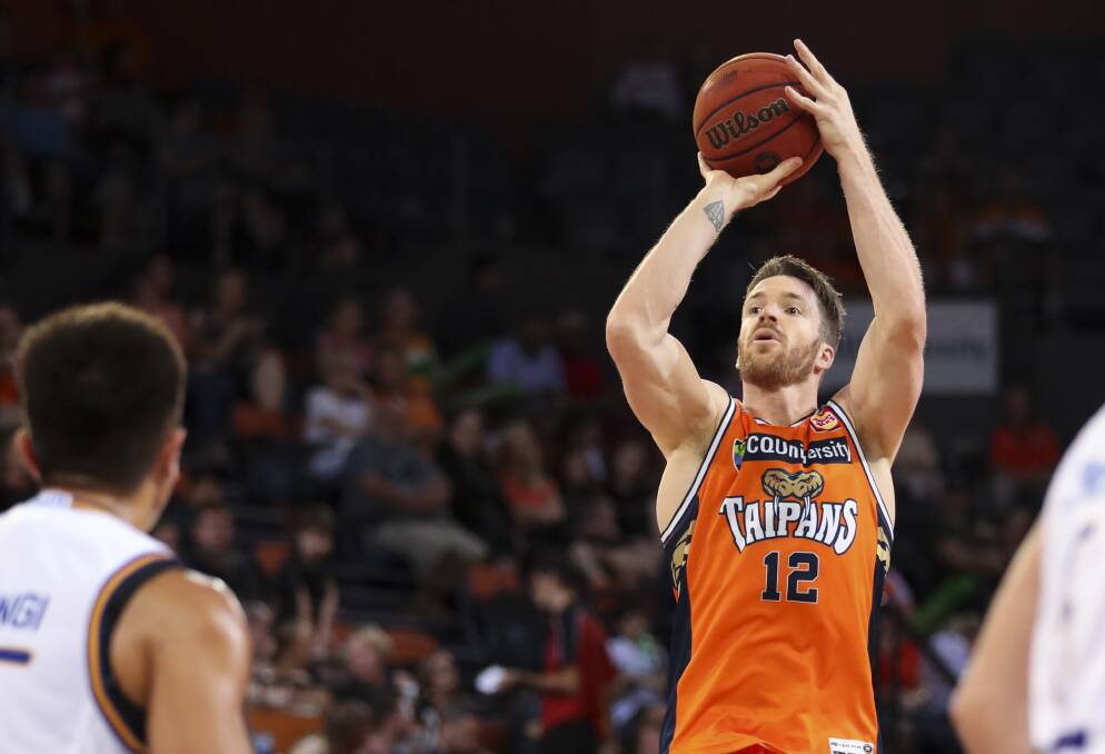 HOOP SHOTS: Lucas Walker playing for Cairns Taipans last week. Picture: AAP.