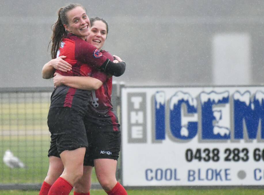 RED ATTACK: Star Georgia Foote celebrates one of the many Ulverstone goals. 