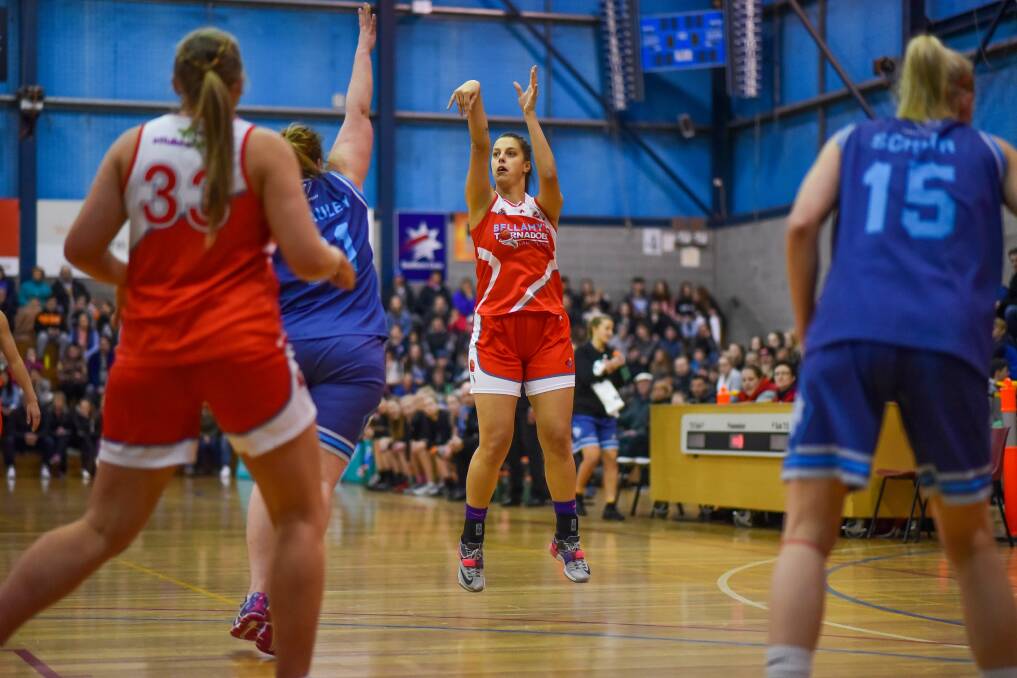 LONG RANGE: Olivia Chugg looks to shoot for three in the opening term at Elphin Sports Centre. Picture: Scott Gelston