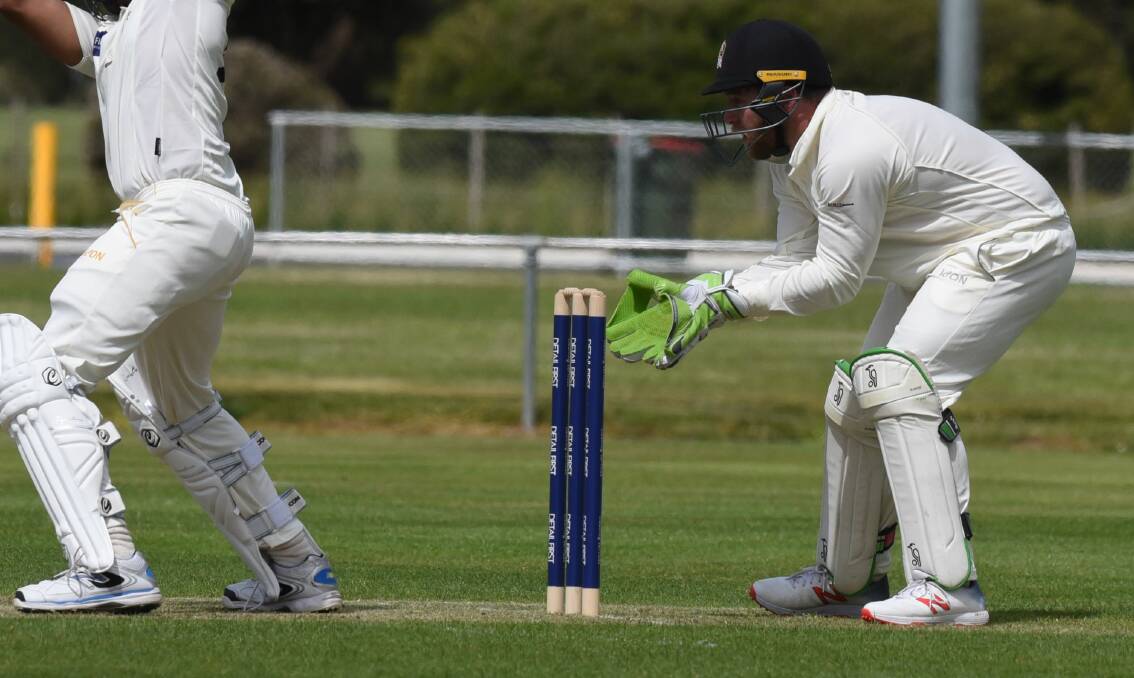 SHAKY GROUND: Greater Northern Raiders gloveman Alistair Taylor went down keeping up to the stumps and was forced off the ground and into hospital after the blow to the head on Saturday. Picture: Paul Scambler