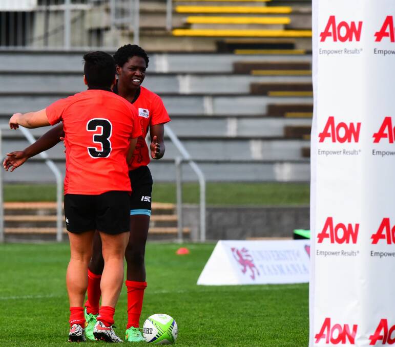 WELL DONE: Perennial tryscorer Kiki Morgan has continued to drive the UTAS Lions at the National University Sevens Series. Picture: Phillip Biggs