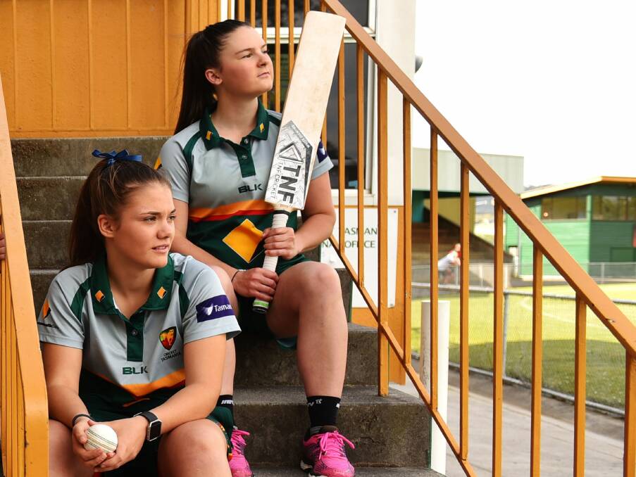 FUTURISTIC: Tasmanian Tigers pair Emma Manix-Geeves and Courtney Webb look out at the NTCA headquarters.