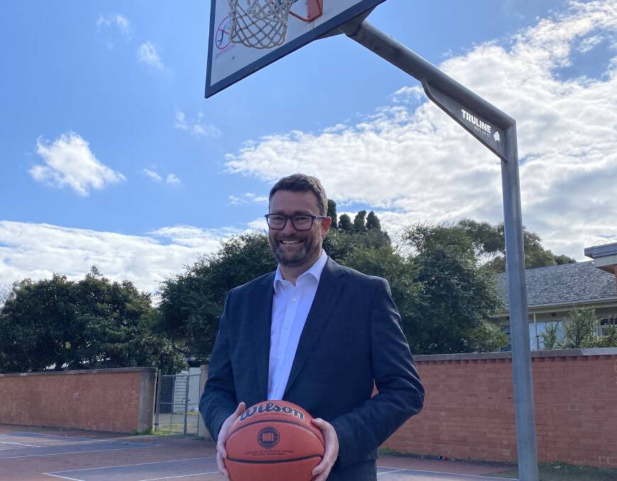 UNDER THE RING: Tasmanian NBL team chief executive Simon Brookhouse familiarises himself with the basketball court some time after his playing days. Picture: NBL Media 