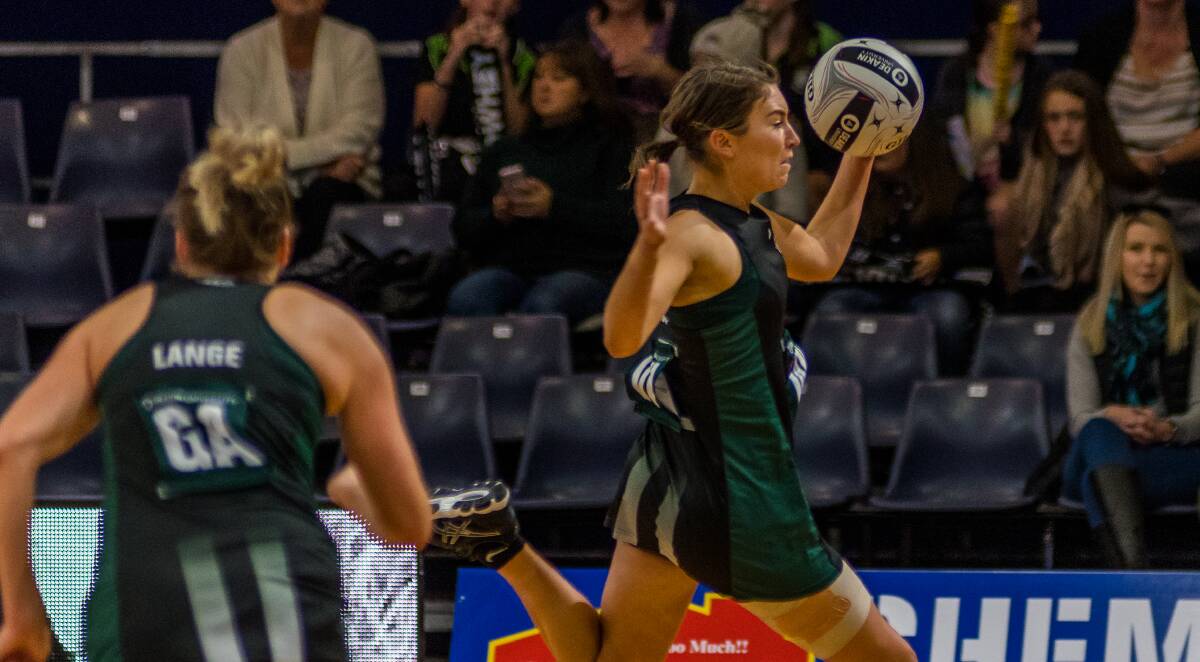 ON THE BURST: Talented wing attack Kelsie Rainbow leaps to get possession back for Tasmanian Magpies. Picture: Phillip Biggs