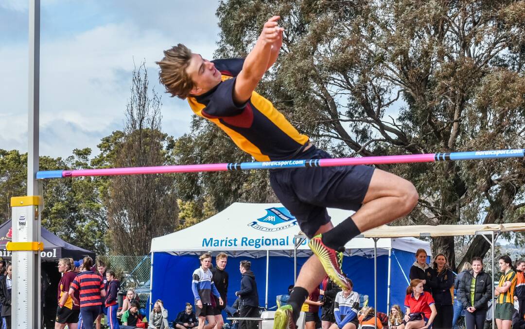 LEAPER: Scotch Oakburn's Tom McShaw looks to clear the bar in the high jump.