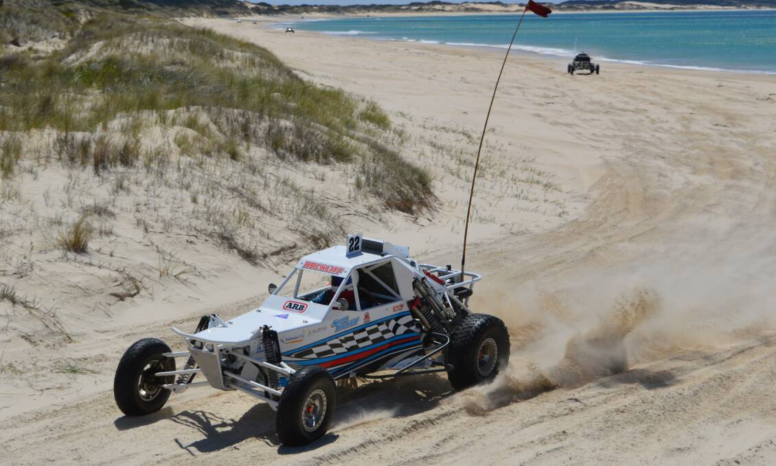 SMASHING IT: Perennial Tasmanian sand enduro winner Scott Rockliff extends his lead on Sunday over one of his rival drivers at Peron Dunes. Picture: Jack Donohoe