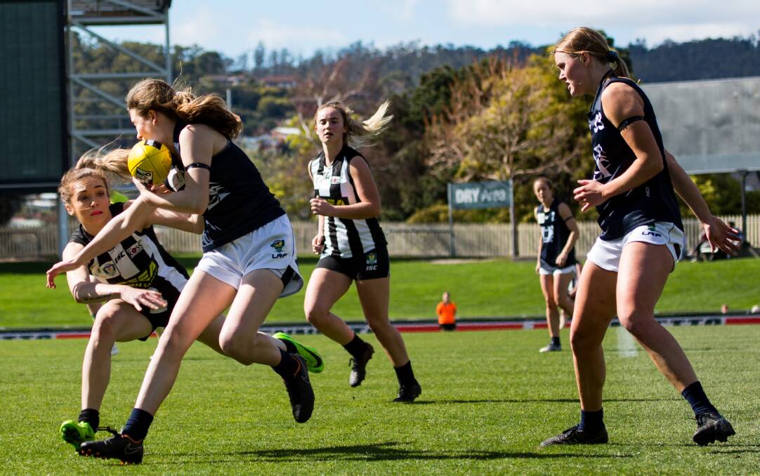 FIERCE: Glenorchy look to trap Launceston in the Magpies nest.