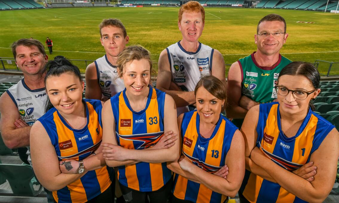 AND ONE FOR THE LADIES: Evandale women Courtney Grice, Cheridan Weedon, Kylie Downie, Kristy Perry join Justin Metcalf, Tom Couch, Andrew McLean, Matt Jones to support the Muscular Dystrophy charity game. Picture: Phillip Biggs