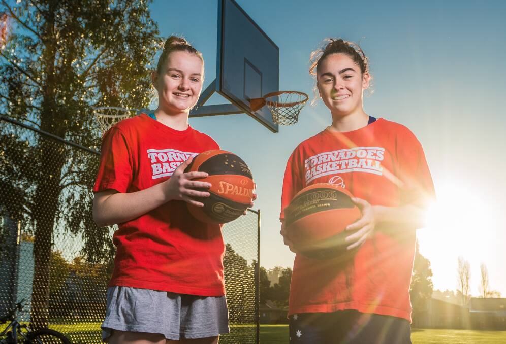 BEAMING: Launceston Tornadoes Micah Simpson and Aishah Anis rise to the occasion with the sun out of coronavirus isolation. Picture: Phillip Biggs