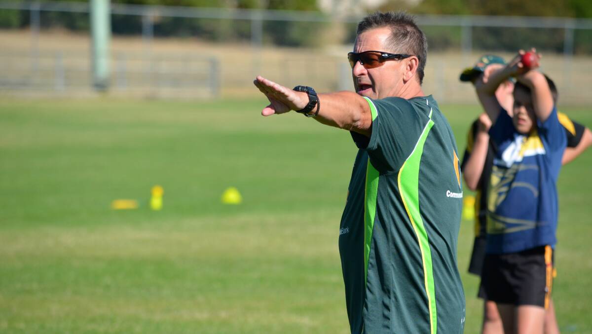 ADVISING: Ex-Tasmanian Tigers coach Tim Coyle has been integral to fixing Australia's sloppy fielding habits during a recent camp at the national cricket centre in Brisbane.  