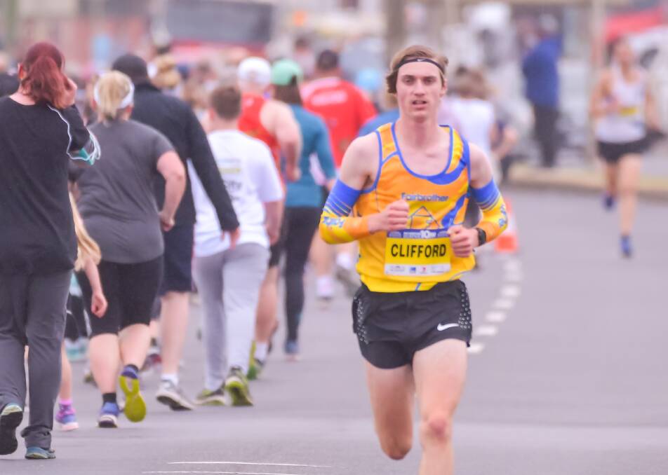 ALL ALONE: Sam Clifford hits the pavement ahead of rivals in Burnie.